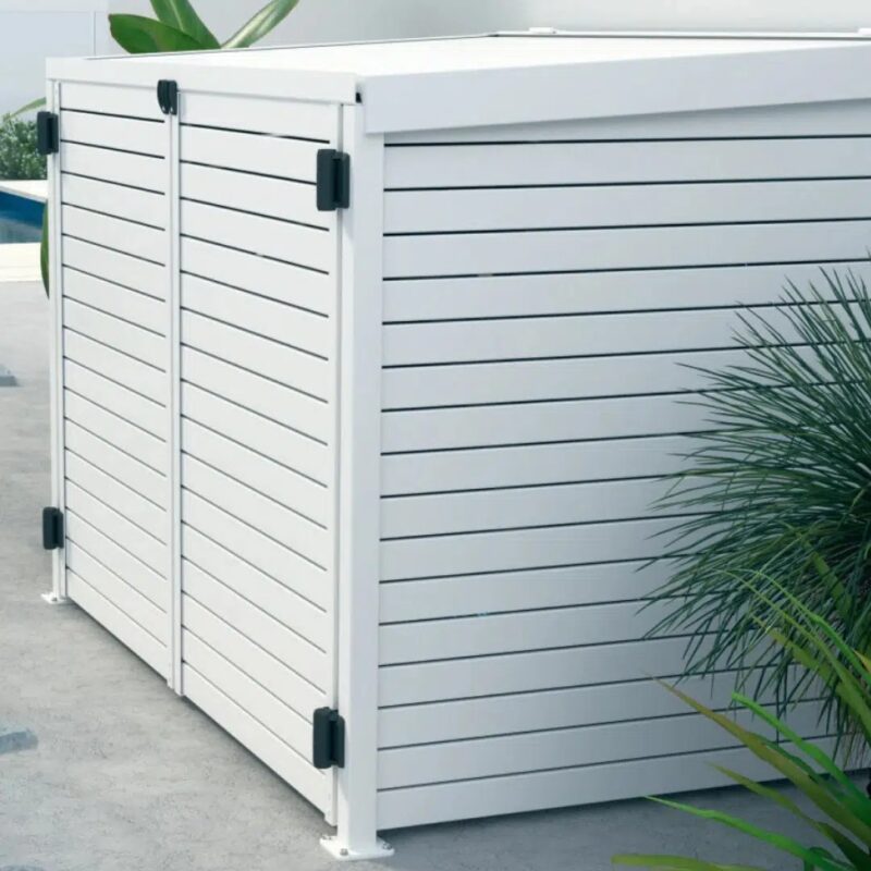 a white shed on a patio